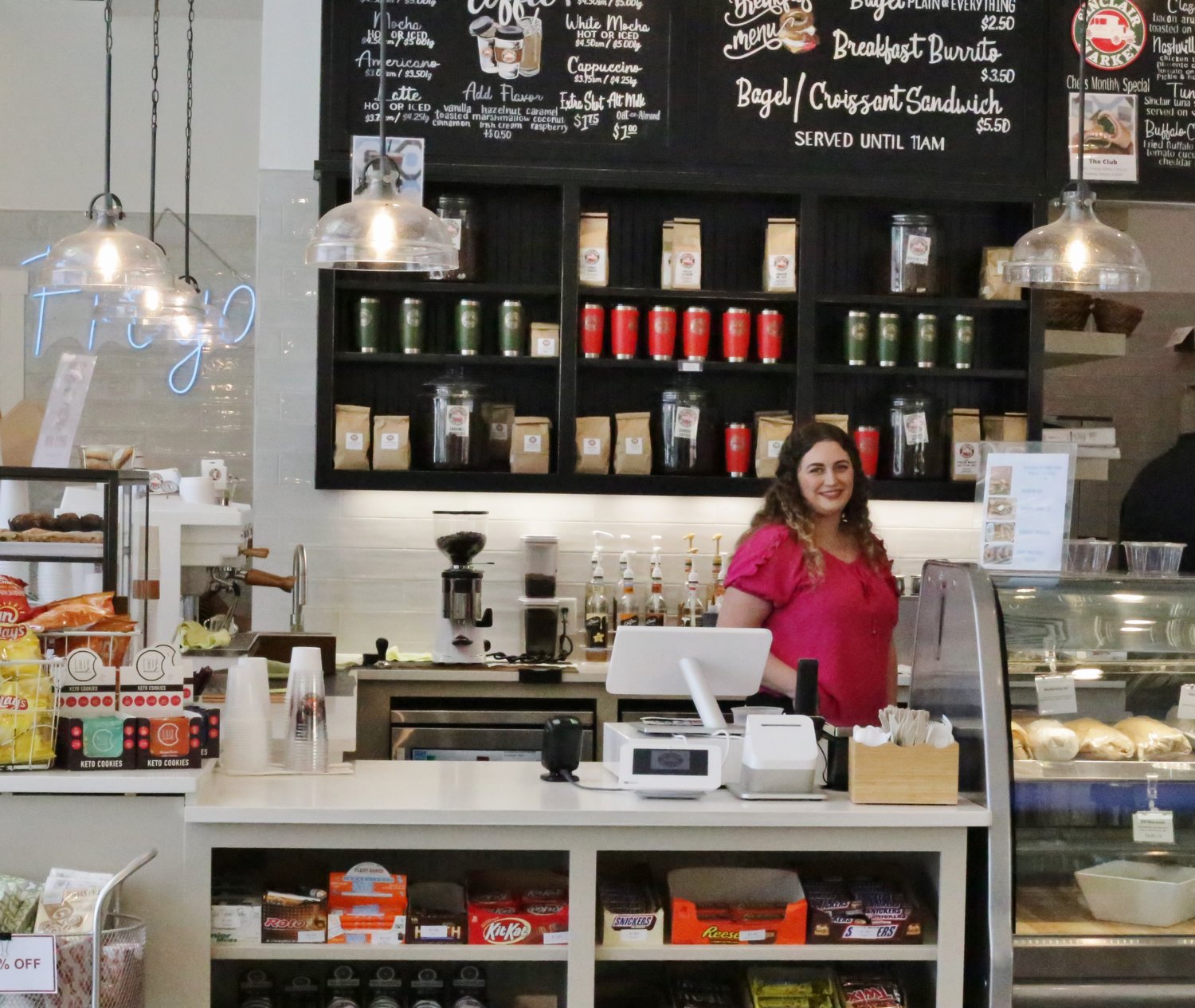 The business counter at the market, with operations manager Kaitlynn Rush.